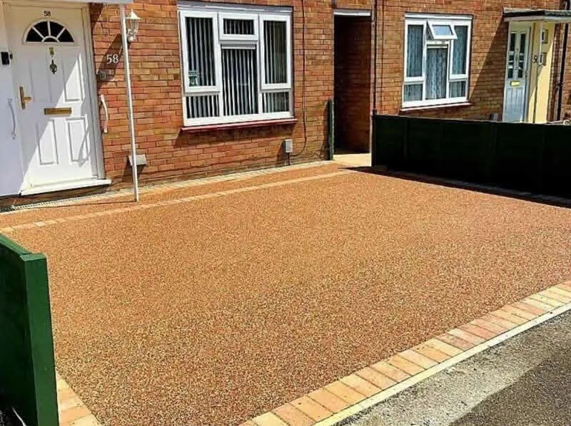 Resin-bound driveway with dark block border