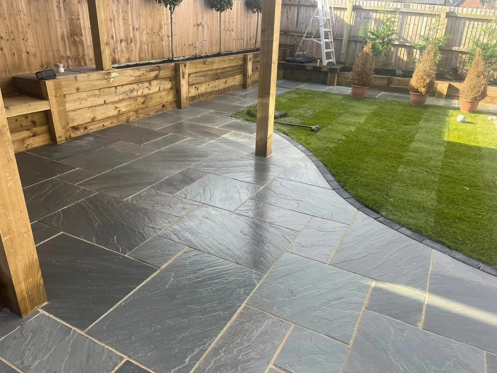 Completed paved patio and landscaped garden seating area